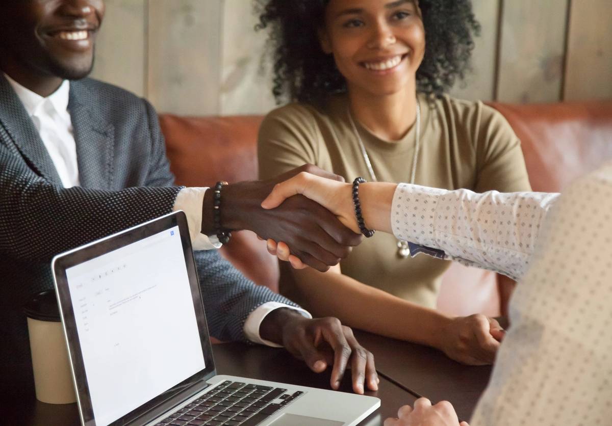 Transaction Coordination you can trust showing a firm handshake